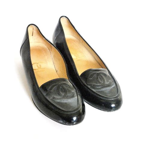 black and white vintage logo chanel loafer